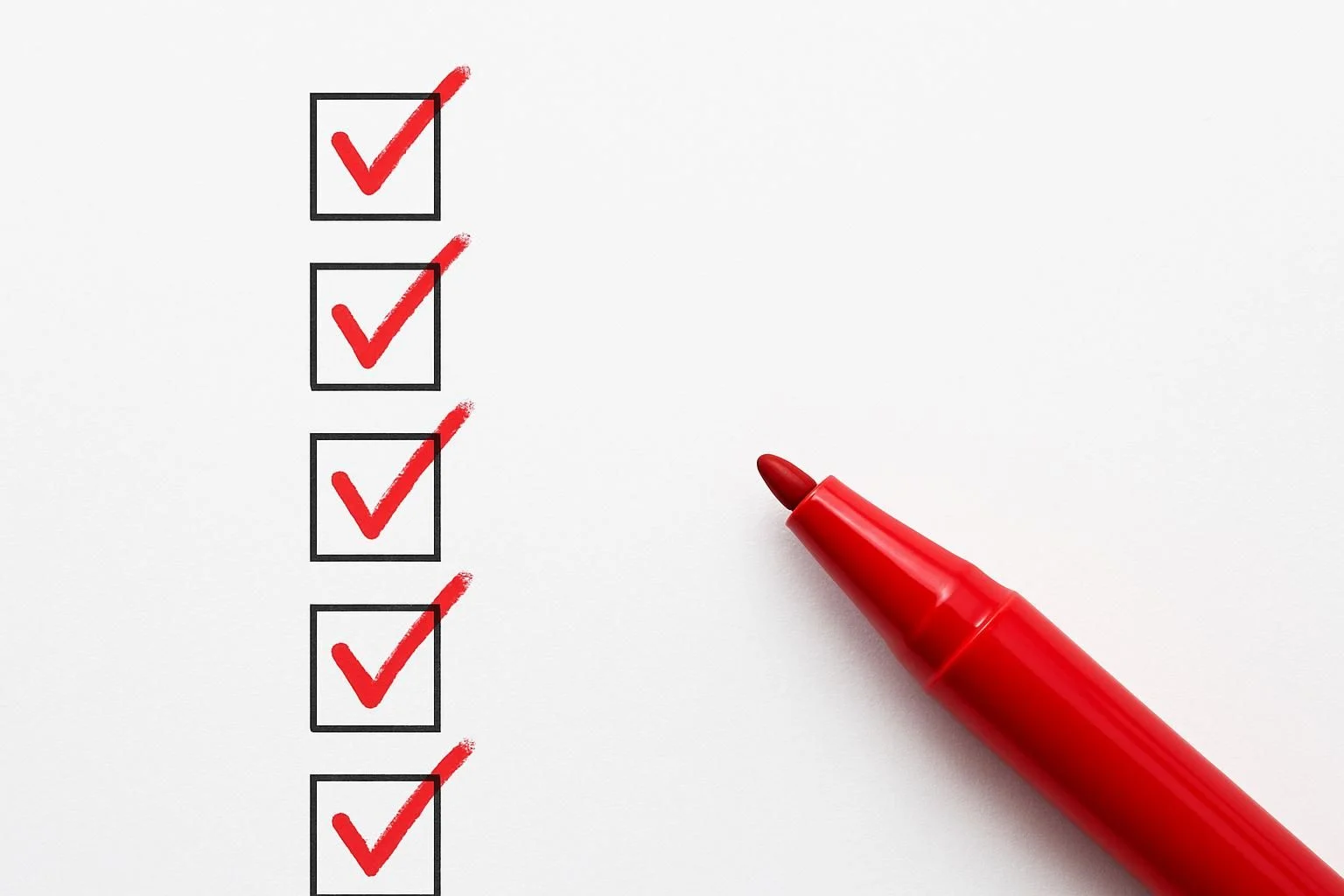 A checklist with common API mistakes, highlighted with a red pen.
